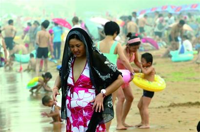 未來三天青島高溫高濕 陣雨來襲最高34℃