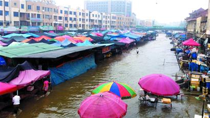 市區(qū)34.1℃創(chuàng)今年最高溫 降雨淹李村大集